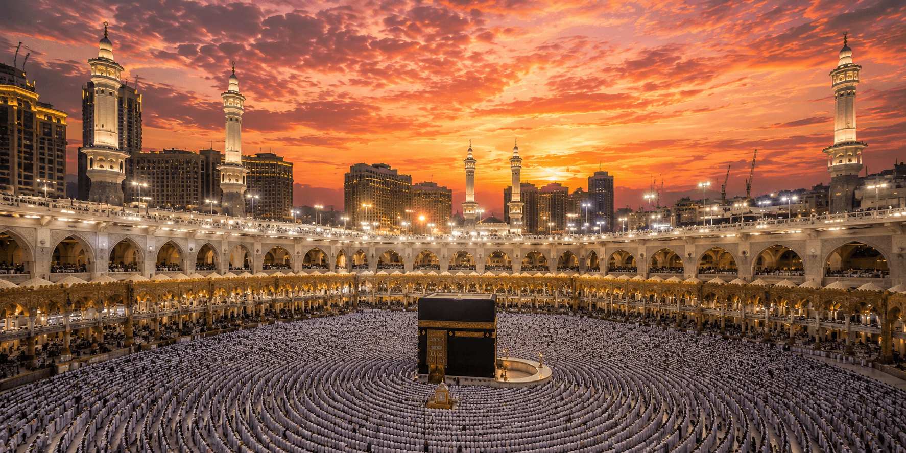 Masjid al-Haram at dusk — the Kaaba glowing under a golden sky